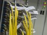 Ilustrační foto - Optické kabely v sálu pro ústřední prvky LTE sítě - ilustrační foto. 