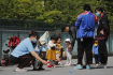 Ilustrační foto - Děti si hrají na chodníku v Pekingu. Ilustrační foto. 