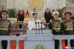 Severokorejský vůdce Kim Čong-un při projevu během vojenské přehlídky k 90. výročí založení armády KLDR na Kim Ir-senově náměstí v Pchjongjangu 25. dubna 2022.