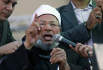 Ve věku 96 let zemřel egyptský islámský teolog a duchovní vůdce Muslimského bratrstva Júsuf Karadáví (na snímku z roku 2011). 