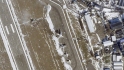 Běloruská letecká základna Mačuliščy u Minsku na satelitním snímku Planet Labs PBC z 19. února 2023, uprostřed  průzkumný letoun A-50.