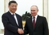 Čínský prezident Si Ťin-pching (vlevo) a jeho ruský protějšek Vladimir Putin, 20. března 2023.