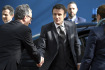 Francouzský prezident Emmanuel Macron (uprostřed) po příjezdu na summit EU v Bruselu 23. března 2023.
