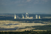 Uhelný důl Turów u česko-polské hranice a sousední elektrárna z větrného parku ve Václavicích, 21. srpna 2023 v Hrádku nad Nisou na Liberecku.