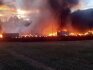 Hasiči zasahují u požáru třídírny odpadů v Dolních Hbitech na Příbramsku, 25. srpna 2023. 