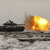 Ilustrační foto - Tank T-72B3 střílí během cvičení ruské armády. Ilustrační foto. 